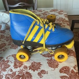 Blue and yellow vintage rollerskates.